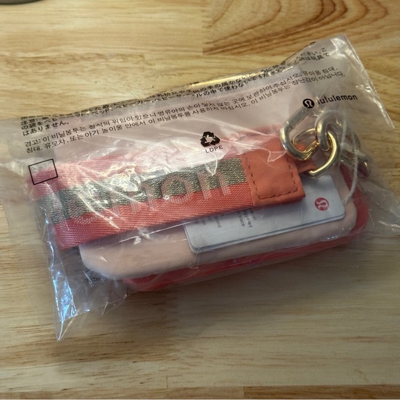 NWT Lululemon Dual Pouch Wristlet Coral Pink Mist Peach Cream NWT - Picture 6 of 7